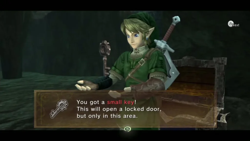 Link holding up a Small Key in front of a chest in the Goron Mines Link holding up a Small Key in front of a chest in the Goron Mines