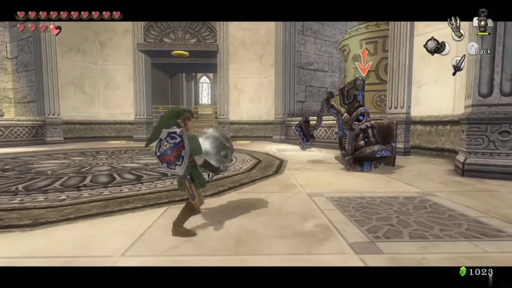 Link with shield up facing an Armos statue on a pedestal Link with shield up facing an Armos statue on a pedestal