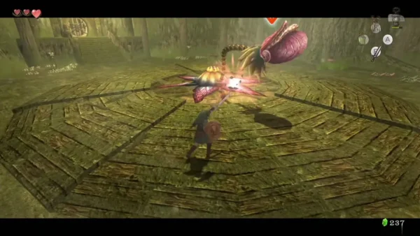 Link attacking the head of a Big Baba on a circular wooden floor Link attacking the head of a Big Baba on a circular wooden floor
