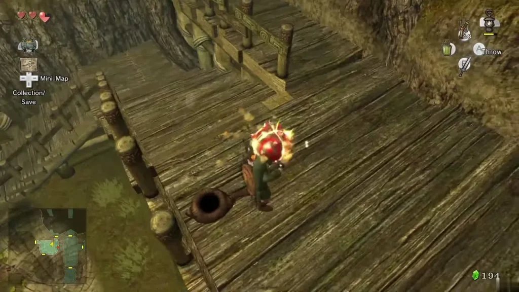 Link holding up a red Bombling bomb on a Forest Temple walkway Link holding up a red Bombling bomb on a Forest Temple walkway