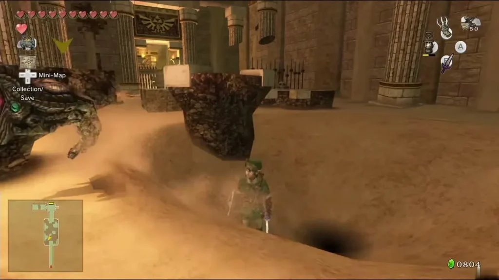 A scaled sand worm lunging out of the quicksand beside Link in the Arbiter's Grounds A scaled sand worm lunging out of the quicksand beside Link in the Arbiter's Grounds