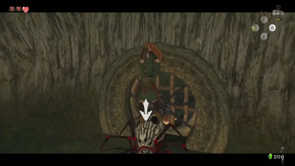 Skulltula with a skull front hanging above a round wooden door Skulltula with a skull front hanging above a round wooden door