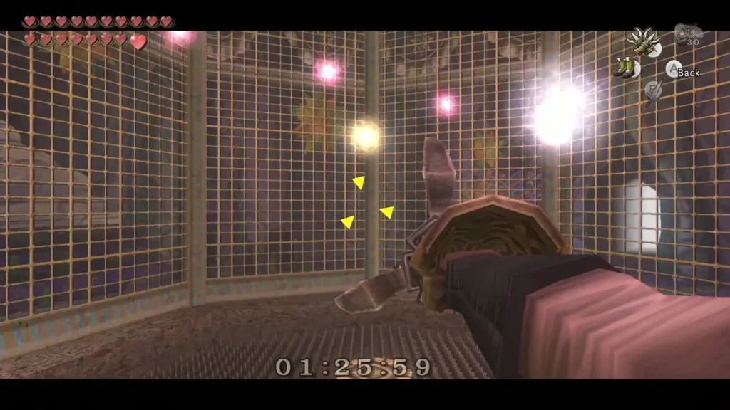 First-person Clawshot aimed at glowing stars in the STAR Game cage with the timer running First-person Clawshot aimed at glowing stars in the STAR Game cage with the timer running