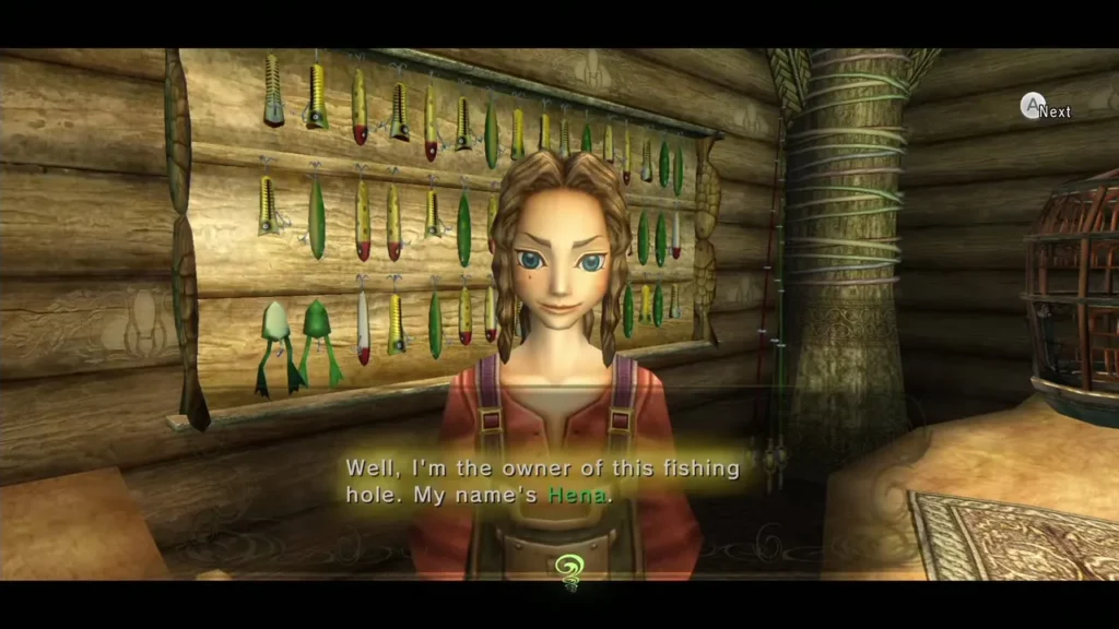 Hena introducing herself in front of the wall of lures in her hut Hena introducing herself in front of the wall of lures in her hut