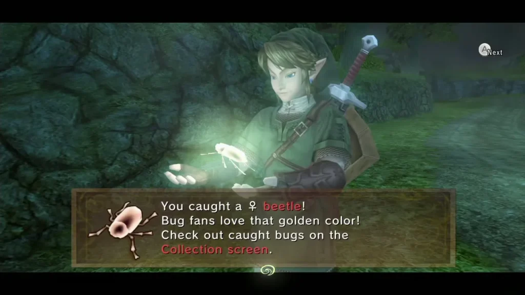 Link holding the golden Female Beetle with the caught message box shown
