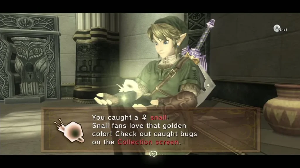 Link holding up a glowing golden female snail under its catch message box in the Temple of Time