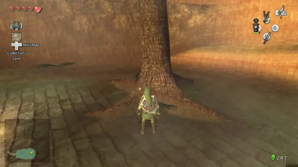 Link standing under the tree beside the tomb entrance in the Kakariko graveyard