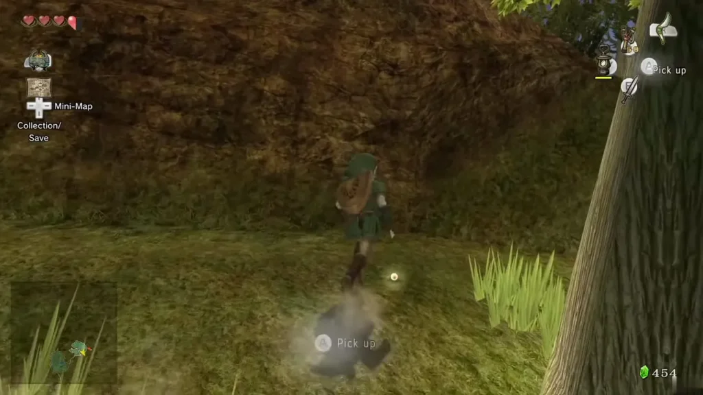 Link in the tall grass by the trees with a pill bug on the ground to pick up
