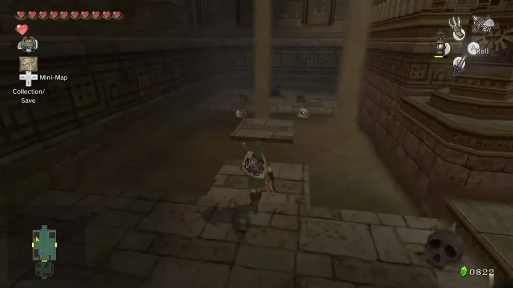 Link standing in the sandy stone room with stairs and a skull in the Arbiter Grounds Link standing in the sandy stone room with stairs and a skull in the Arbiter Grounds