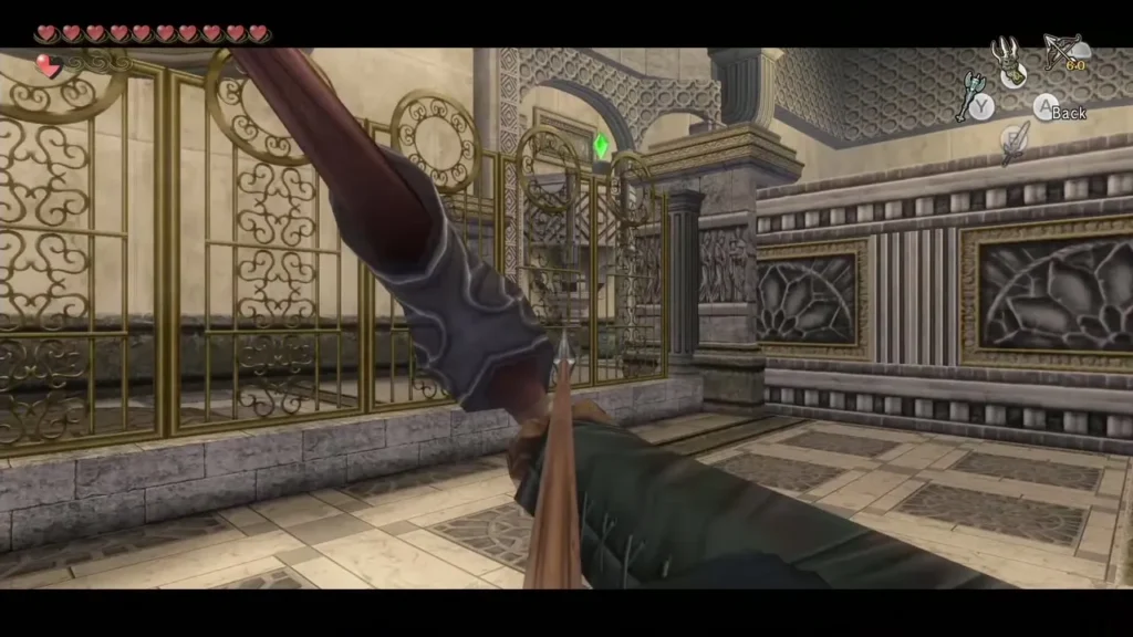 Link aiming at the green crystal switch behind the golden gate Link aiming at the green crystal switch behind the golden gate