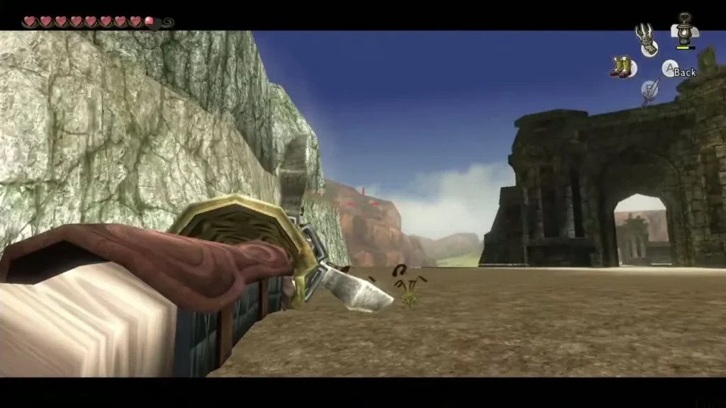 Link aiming the Clawshot at a target on the ledge north of the Bridge of Eldin Link aiming the Clawshot at a target on the ledge north of the Bridge of Eldin
