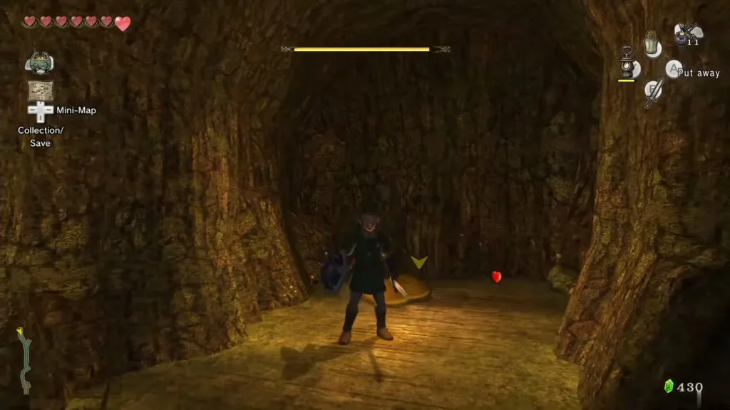Link with the Lantern lit inside the narrow root-walled cave Link with the Lantern lit inside the narrow root-walled cave