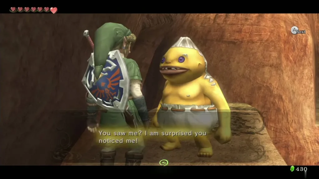 The hiding Goron in the cliff opening saying he is surprised Link noticed him The hiding Goron in the cliff opening saying he is surprised Link noticed him