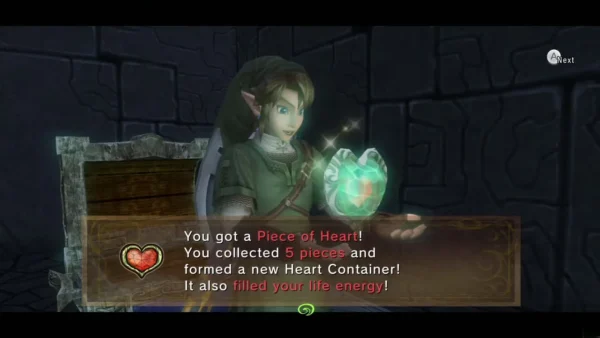Link holding the final Piece of Heart, with the message that forms a Heart Container Link holding the final Piece of Heart, with the message that forms a Heart Container