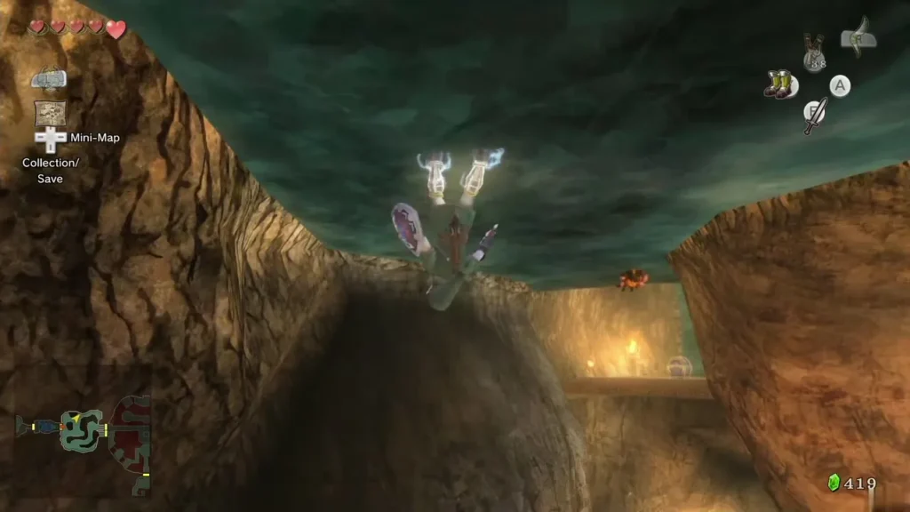 Link walking the magnetic ceiling of the cave in Iron Boots Link walking the magnetic ceiling of the cave in Iron Boots