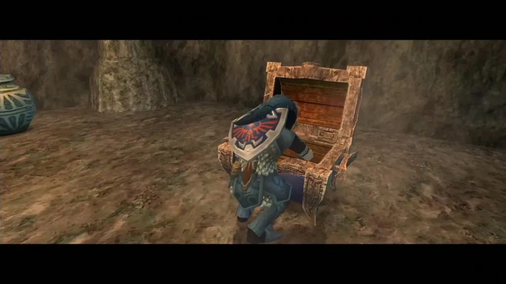 Link at the open chest in the small room beyond the gate Link at the open chest in the small room beyond the gate