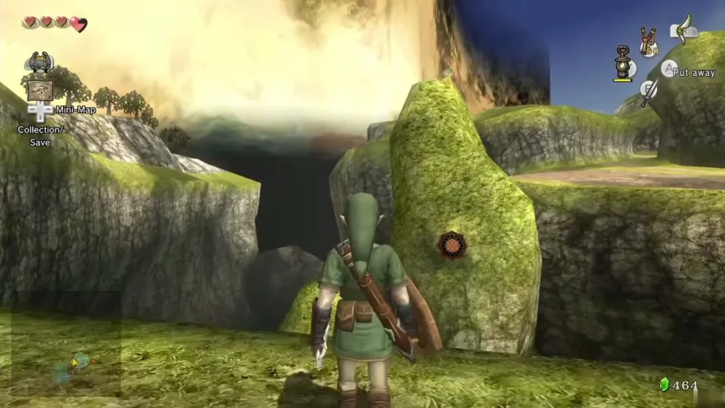 Link stands beside a mossy rock formation with a target on its side Link stands beside a mossy rock formation with a target on its side