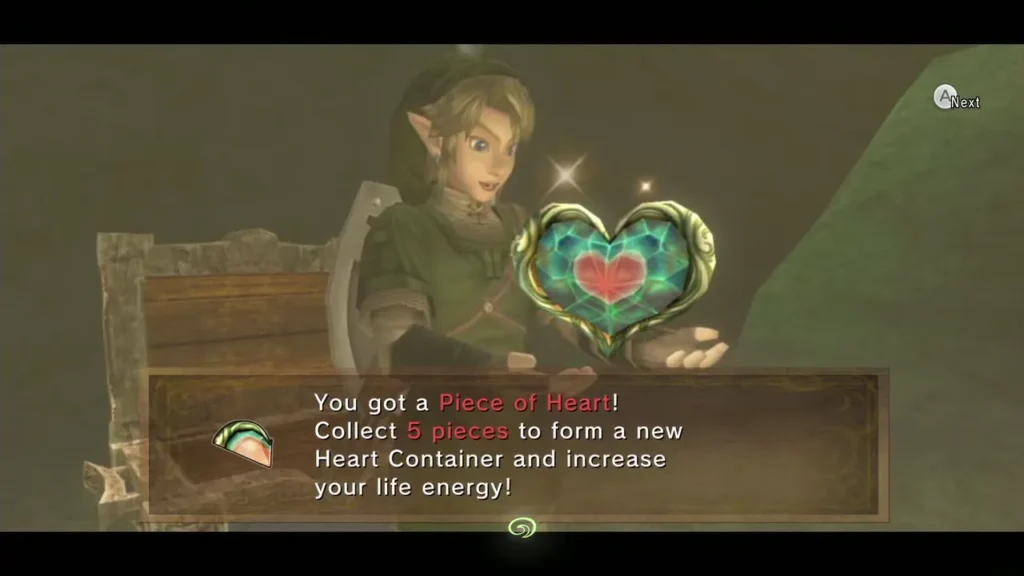 Link holding up the Piece of Heart with its message box Link holding up the Piece of Heart with its message box