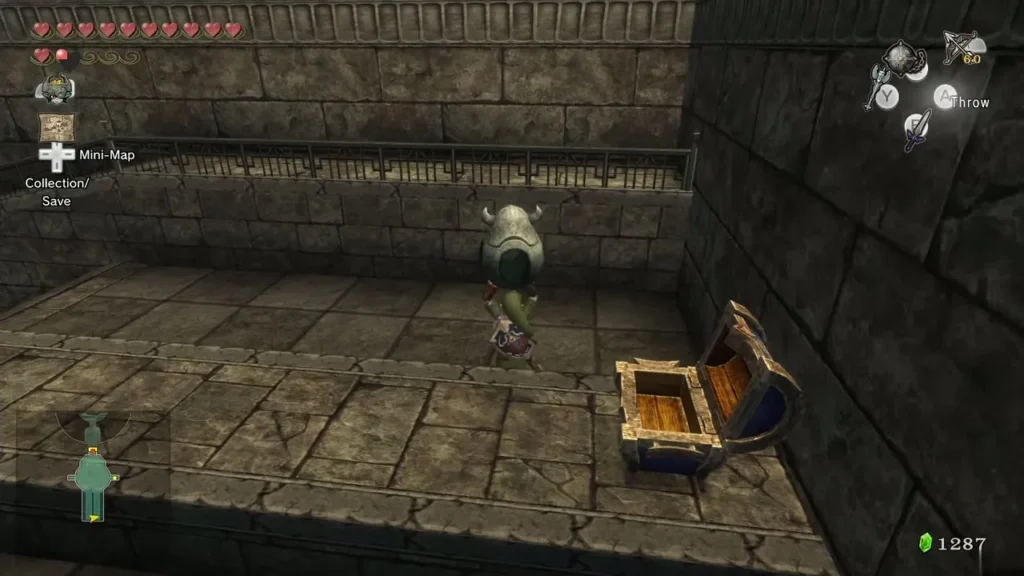 Link standing near the open chest on a stone ledge in the Temple of Time Link standing near the open chest on a stone ledge in the Temple of Time