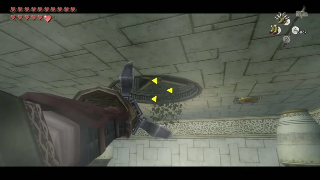 Clawshot aimed at yellow targets on a stone ceiling Clawshot aimed at yellow targets on a stone ceiling