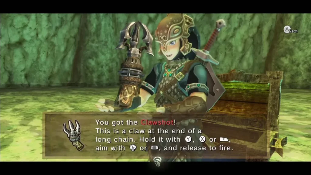 Link holding up the Clawshot with the You got the Clawshot message box Link holding up the Clawshot with the You got the Clawshot message box