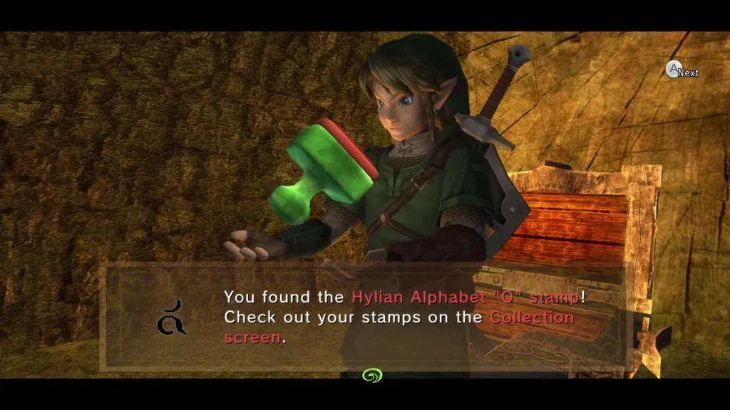 Link holding up the Hylian Alphabet O stamp beside an open chest in a wooden cavern
