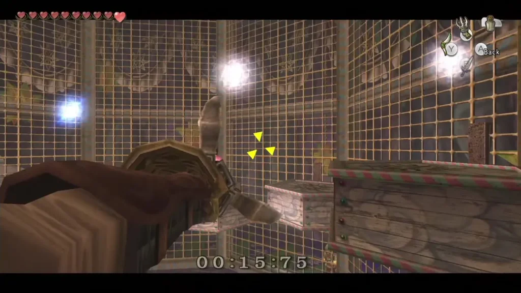 Clawshot aimed at glowing orbs in the second circus cage round Clawshot aimed at glowing orbs in the second circus cage round