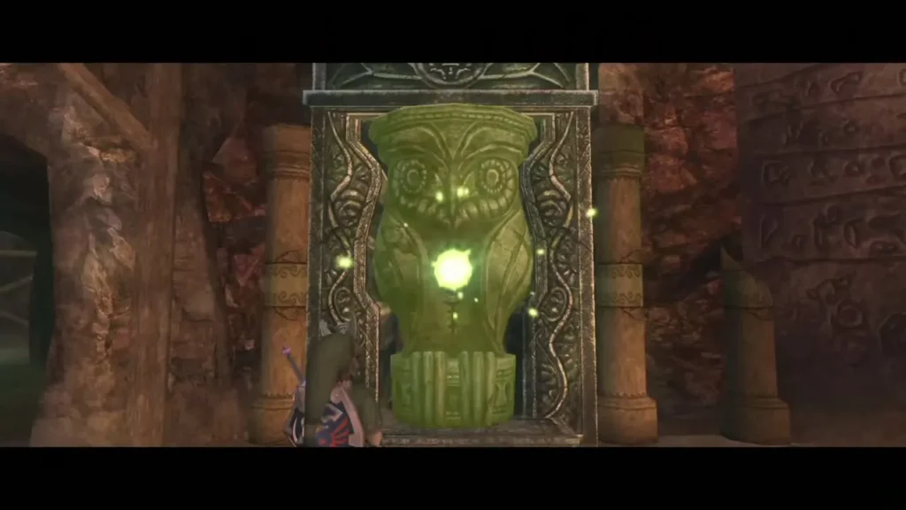 The green-glowing Owl Statue in the Sanctuary cellar with Link approaching it
