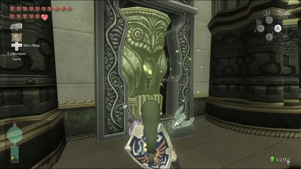 Link beside an Owl Statue shifted out of its alcove in the Temple of Time entrance hall