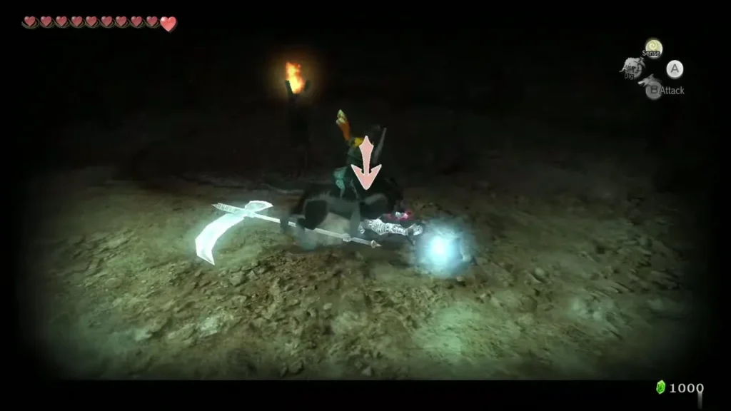 Wolf Link slashing a Poe on the floor of the dark cavern, a red arrow marking it Wolf Link slashing a Poe on the floor of the dark cavern, a red arrow marking it