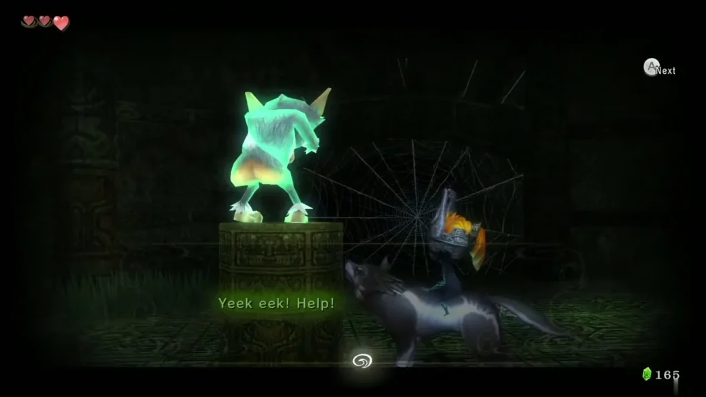 The Yeek monkey on a stone pedestal cries for help beside a spider web