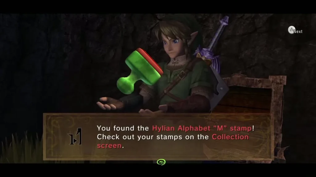 Link holding the Hylian Alphabet M stamp with its message box Link holding the Hylian Alphabet M stamp with its message box